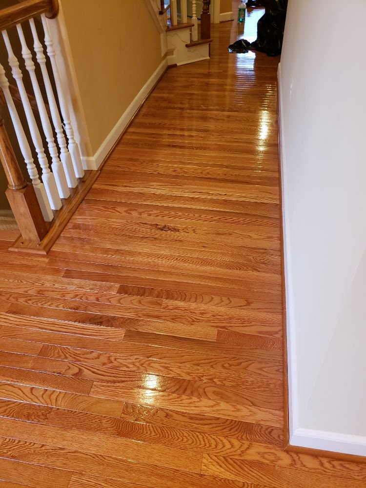 Restored hardwood floor with bright shine