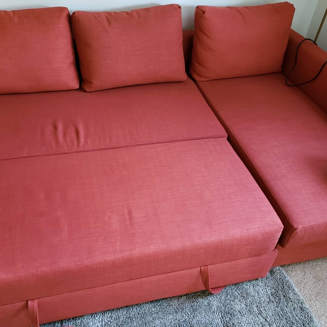 Red sectional sofa after professional upholstery cleaning