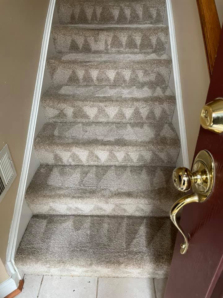 Detailed view of cleaned carpeted stairs